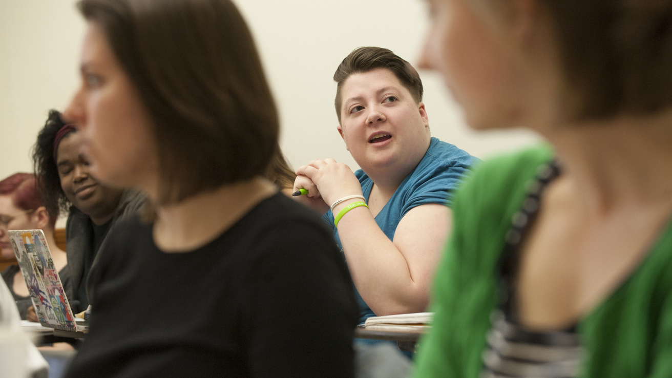 student discussing topics in class